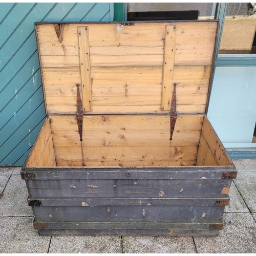 37 - An early 20th century, East Midlands railway (EMR) pitched pine trunk/chest with steel hinges, handl... 