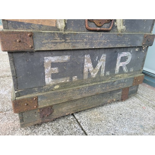 37 - An early 20th century, East Midlands railway (EMR) pitched pine trunk/chest with steel hinges, handl... 