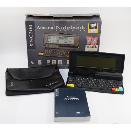 A boxed NC200 Amstrad notebook computer, with original user manual.