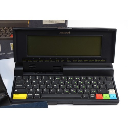 A boxed NC200 Amstrad notebook computer, with original user manual.