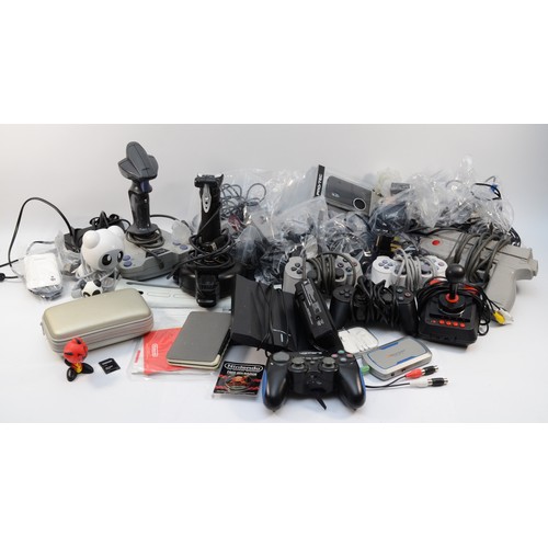 A large collection of gaming controllers and power supplies to include ...