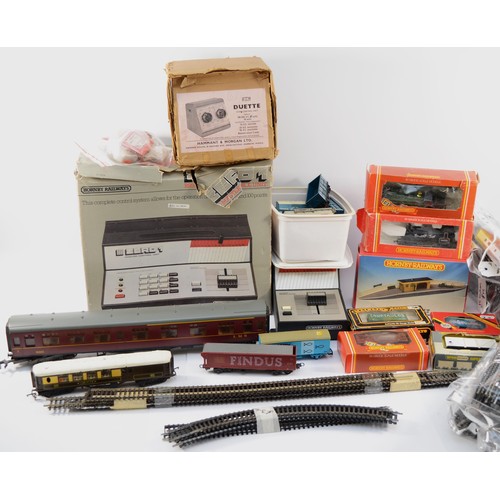 32A - A collection of 00 Gauge train models, track, carriages and controls, to include 00 Gauge Hornby R.0... 