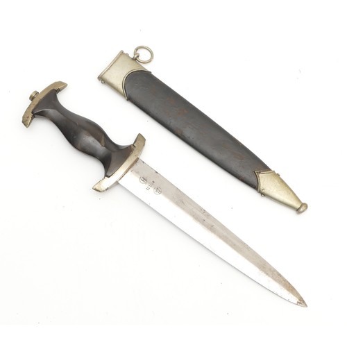 WWII German Third Reich SS Dress Dagger, by RZM 121/34, with ebony grip having eagle and erased SS rune insignia, double edged blade with motto ‘Meine Ehre heist Treue’ and reverse with RZM logo SS runes and ‘121/34’ between, scabbard. The blade 22cms, overall 37cms.
Provenance: Our vendors father swapped it for a packet of cigarettes in Egypt.
Due to the nature of these items, we politely remind buyers of the need to satisfy themselves as to the condition / originality of all lots prior to bidding irrespective of any description. Spicers do not post weapons of any kind.