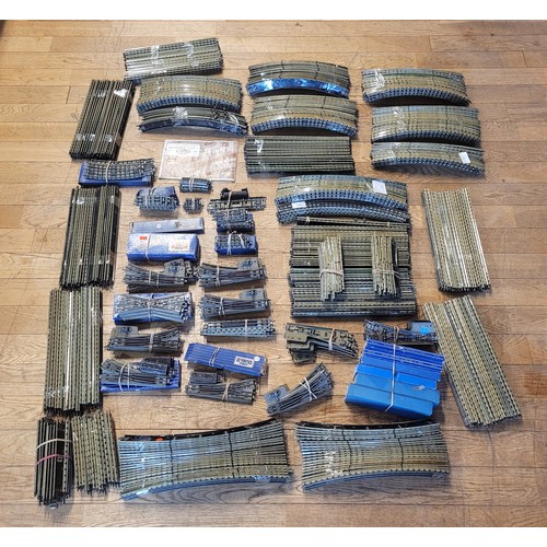 27 - Hornby 00 Gauge Railways; A substantial quantity of loose and boxed Dublo model railway track, (see ... 