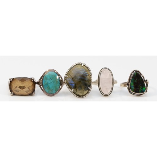 16 - A silver and labradorite dress ring, J, an Arts & Crafts silver and black opal/doublet? ring, shank ... 