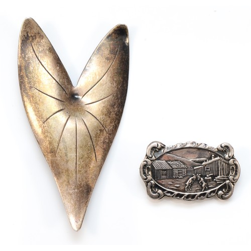 32 - VW Fammik, a Danish silver leaf brooch65mm and an Ivor Hoth silver brooch, 14gm