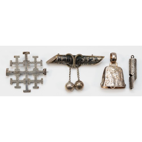 39 - A Russian silver and niello broch, 84 standard, 58mm and silver whistle, Birmingham 1895, a bell, Bi... 