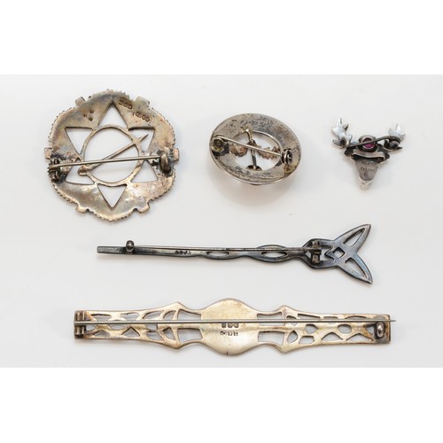 42 - Five silver Scottish Celtic design brooches, 30gm