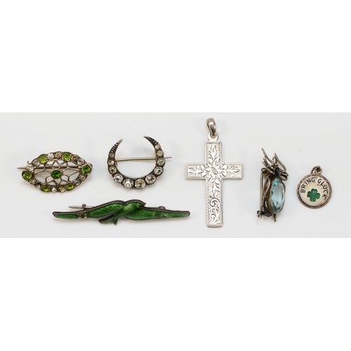 68 - A 935 standard silver and paste crescent brooch, three other brooches and two pendants, 16gm