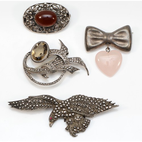 71 - A silver and marcasite eagle brooch, Birmingham 1947, 80mm and three other brooches, 49gm