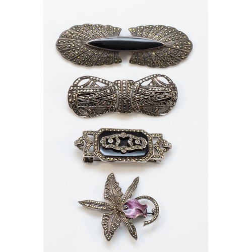 77 - A 935 silver, enamel and marcasite orchid brooch, a silver and marcasite double clip brooch and two ... 