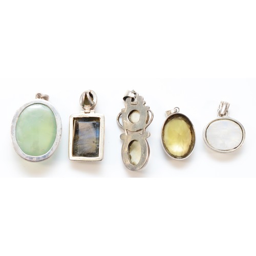 84 - A silver and labradorite pendant, 43mm and four other silver mounted pendants, 96gm