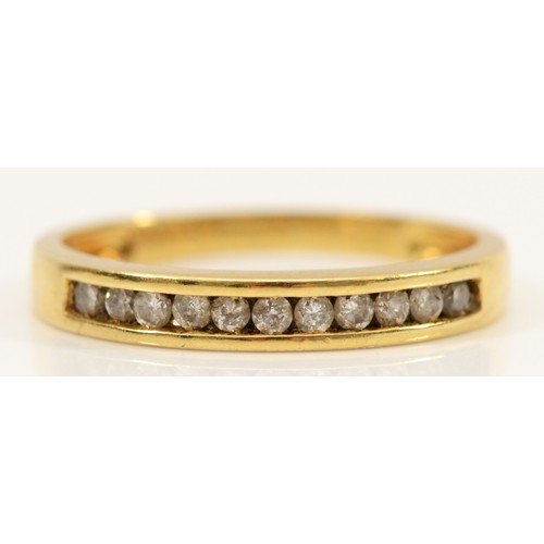 110 - An 18ct gold brilliant cut diamond half eternity ring, channel set, I 1/2, 1.7g