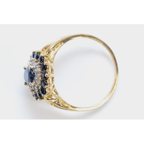 113 - A 9ct gold sapphire and diamond dress ring, T, 3.5g