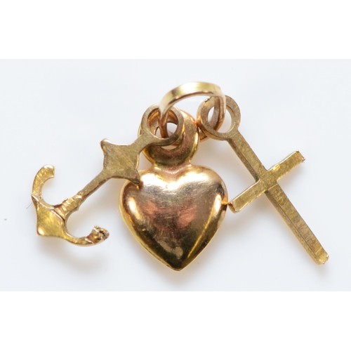 123 - A 9ct gold love, faith and charity charm, 11mm total length, 0.3g