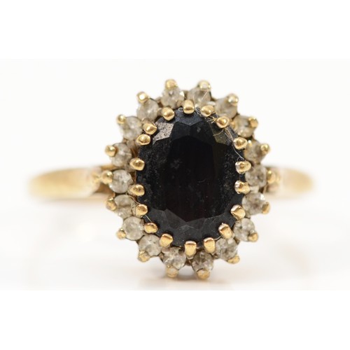 126 - A 9ct gold vintage sapphire and white gemstone cluster ring, O 1/2, 2.7g