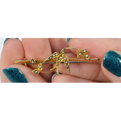 130 - A 9ct gold Victorian seed pearl lovebird brooch, Birmingham 1888, 45mm across, 2.1g