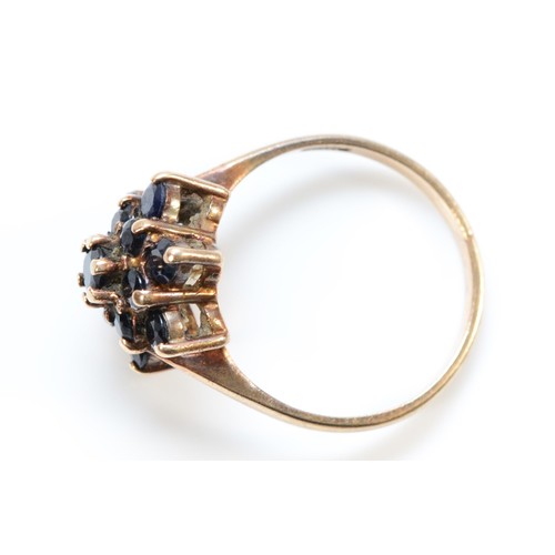 137 - A 9ct gold vintage sapphire cluster ring, M, 2.8g