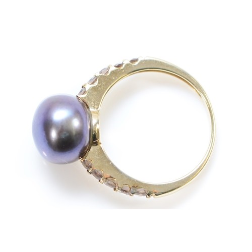 139 - A 9ct gold cultured pearl dress ring with gemstone shoulders, 8mm pearl, J, 2.4g