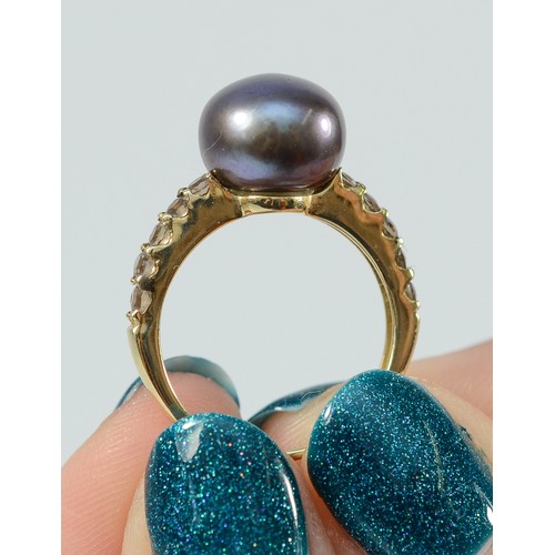 139 - A 9ct gold cultured pearl dress ring with gemstone shoulders, 8mm pearl, J, 2.4g