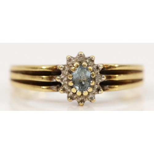 164 - A 9ct gold aquamarine and diamond halo dress ring, M, 3.1g