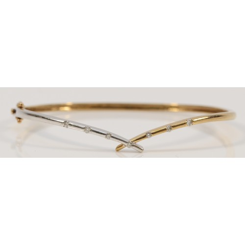 169 - A 9ct gold diamond hinged bangle, 58mm inner, 6.7g