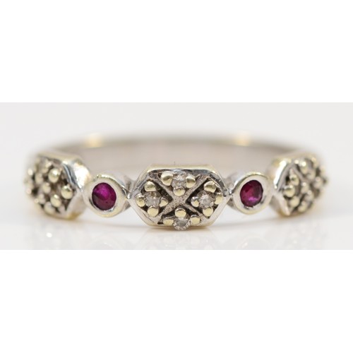 172 - A 9ct white gold ruby and diamond dress ring, N 1/2, 2.9g