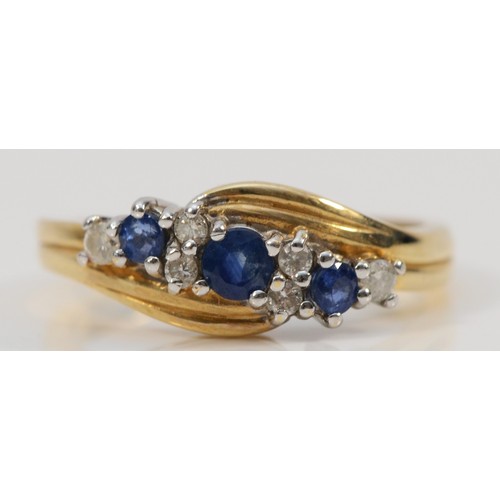 174 - A 14K gold sapphire and diamond dress ring, N, 3.4g