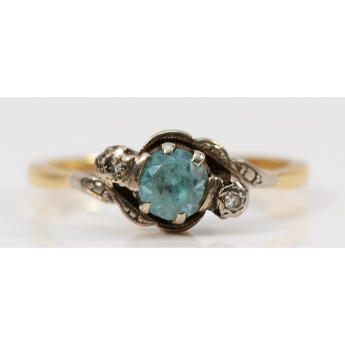 185 - A 9ct gold vintage blue zirconia and diamond dress ring, U, 3.6g