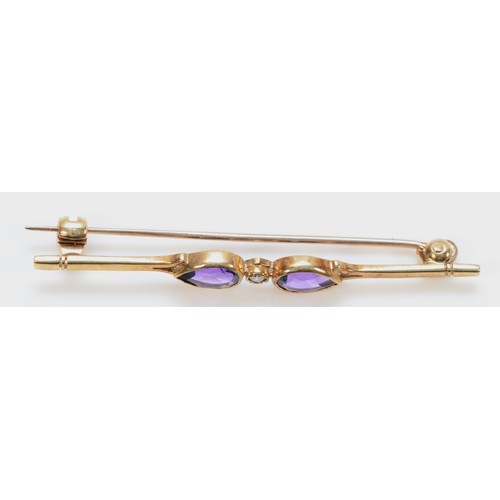 187 - A 9ct gold pear cut amethyst and diamond bar brooch, 50mm across, 2.4g