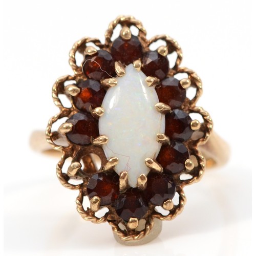 188 - A 9ct gold vintage marquise opal and garnet oval cluster ring, one garnet missing, K 1/2, 4.1g