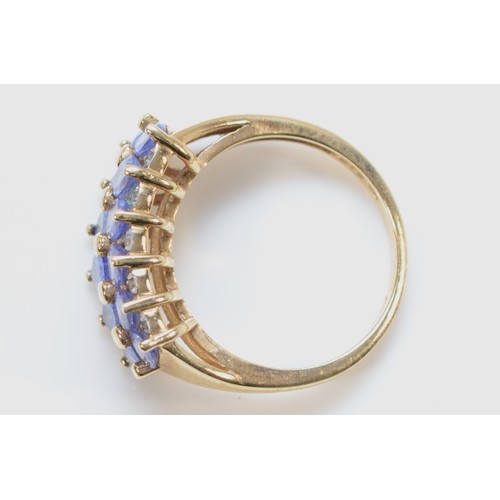 196 - A 9ct gold tanzanite and diamond double row half eternity ring, L, 3.6g