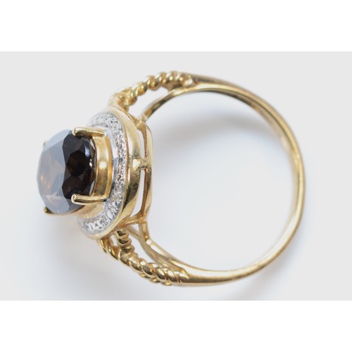 236 - A 9ct gold smokey quartz and diamond dress ring, N, 3.7g