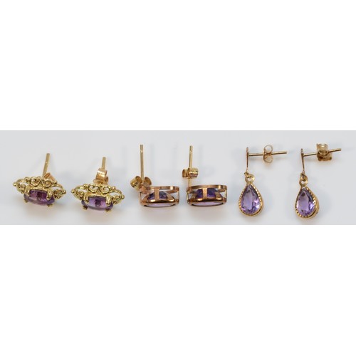 241 - Three pairs of 9ct gold amethyst earrings with scroll backs, 3.3g