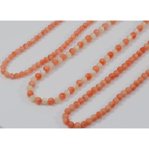 242 - Three coral necklaces, with 9ct gold clasps, 31g