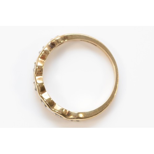 254 - A 9ct gold and diamond half eternity ring, O, 2.8g