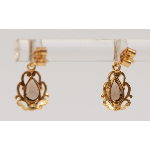 273 - A pair of 9ct gold smokey quartz drop earrings with scroll backs, 0.9g