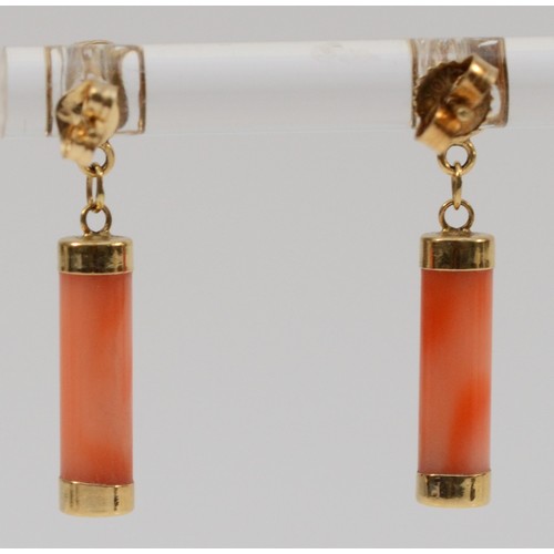 560 - A pair of 14K gold coral drop earrings, 25mm drop, 1.6g