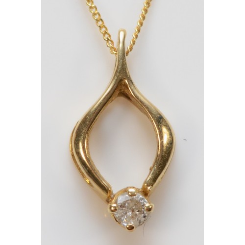 561 - A 14K gold and brilliant cut diamond pendant with chain, 14mm pendant length, 1g