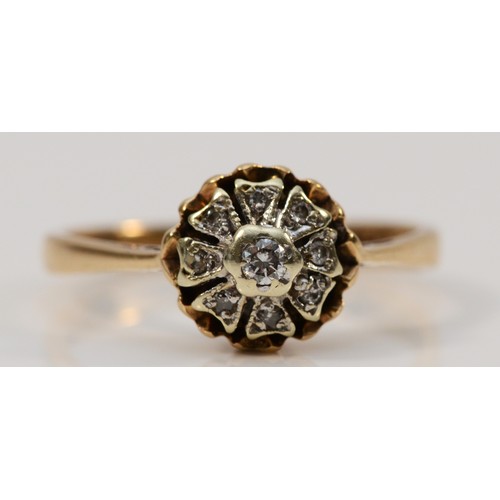 562 - A 9ct gold and diamond cluster ring, 10mm ring front, N 1/2, 2.2g