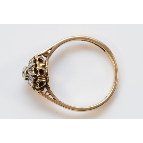 562 - A 9ct gold and diamond cluster ring, 10mm ring front, N 1/2, 2.2g