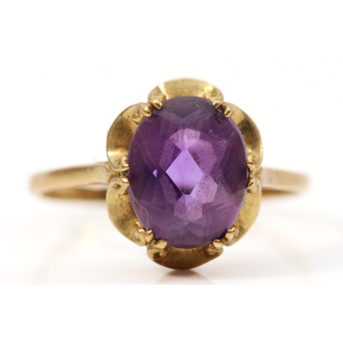 563 - A 9ct gold amethyst dress ring, 10mm x 7mm amethyst, Q 1/2, 1.9g