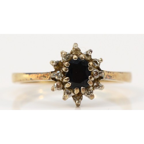 568 - A 9ct gold sapphire and diamond cluster ring, London 1987, M, 2.2g