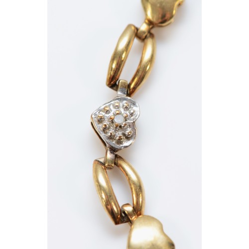 570 - A 9ct gold and diamond heart shaped link bracelet, 18cm, 3.4g