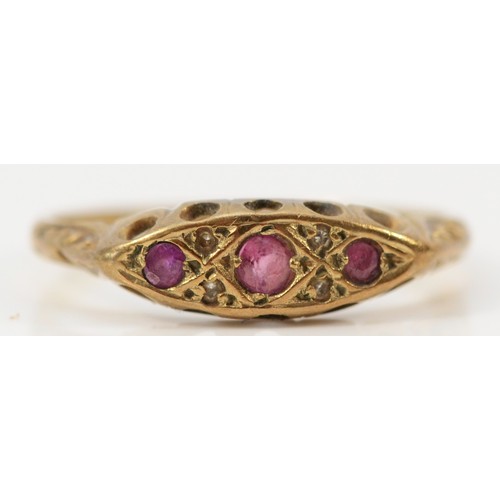 575 - A 9ct gold ruby and diamond ring, L 1/2, 1.1g