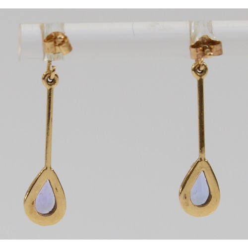 580 - A pair of 9ct gold and tanzanite drop earrings with scroll backs, 25mm drop, 1g