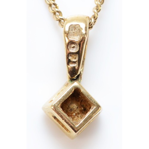 582 - A 9ct gold single brilliant cut diamond pendant, 4mm square pendant, 2.4g