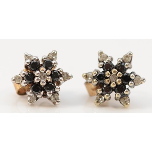 586 - A pair of 9ct gold diamond and sapphire floral cluster earrings, 7mm diameter, 1.2g