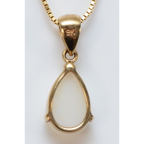 587 - A 9ct gold opal pendant with chain, 8mm opal length, 1.4g