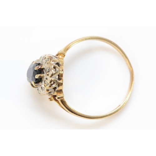 595 - A 9ct gold sapphire and diamond cluster ring, Birmingham 1985, 12mm ring front, L, 2.3g